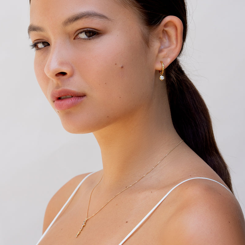 SCDE44-V-WT-Dower-and-Hall-Yellow-Gold-Vermeil-White-Topaz-Hammered-Huggie-Hoops-1