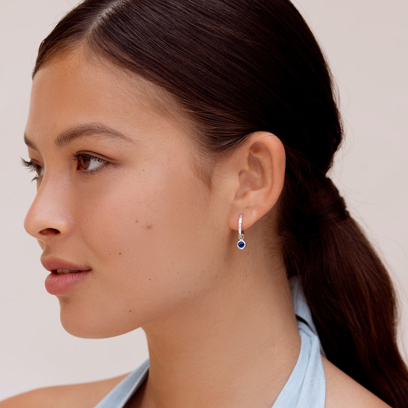 SCDE5-S-BSAPP-Dower-and-Hall-Sterling-Silver-Blue-Sapphire-Hammered-Huggie-Hoops-1