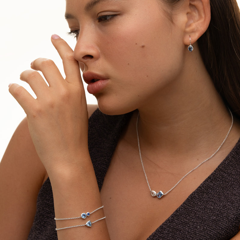TWE31-S-BT-Dower-and-Hall-Sterling-Silver-Pear-Blue-Topaz-Earrings-3