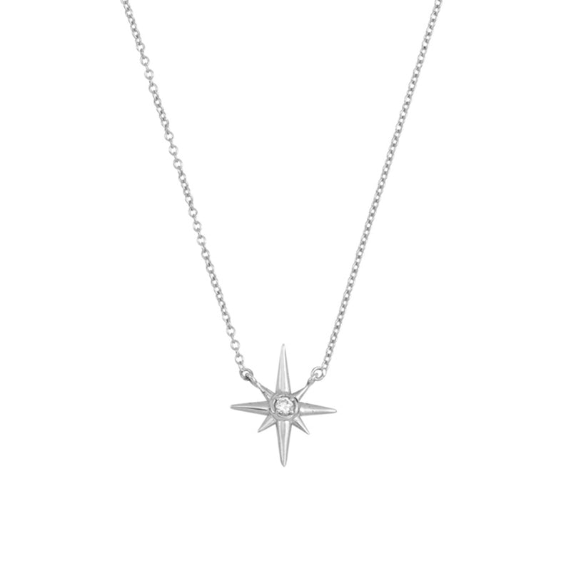 North Star Necklace wearer all these things. 14k gold .